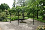 &#169; Marrion Hoogenboom Terras met halfverharding en pergola